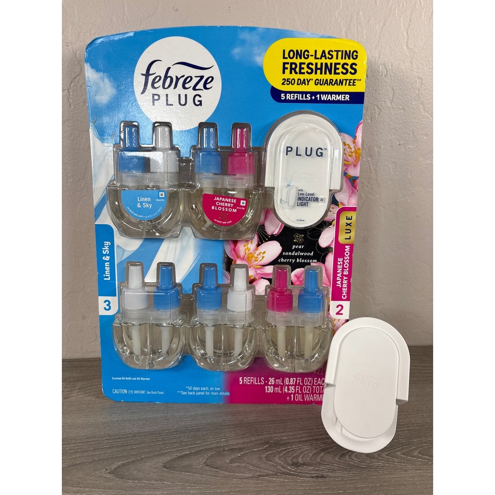 Febreze PLUG Air Freshener Kit 1 Warmer 5 Refills Linen Japanese Cherry Blossom